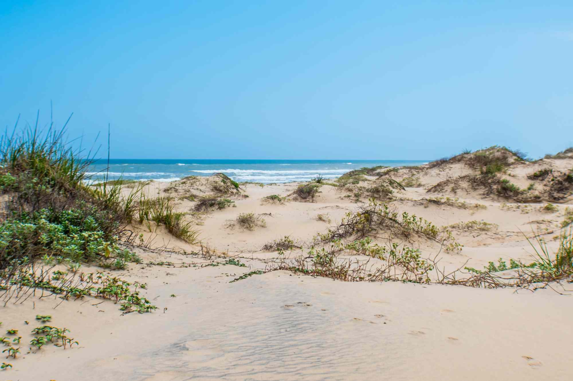 This Beach Town Is Called the ‘Caribbean of Texas’ for Its Clear Water and Soft White Sand