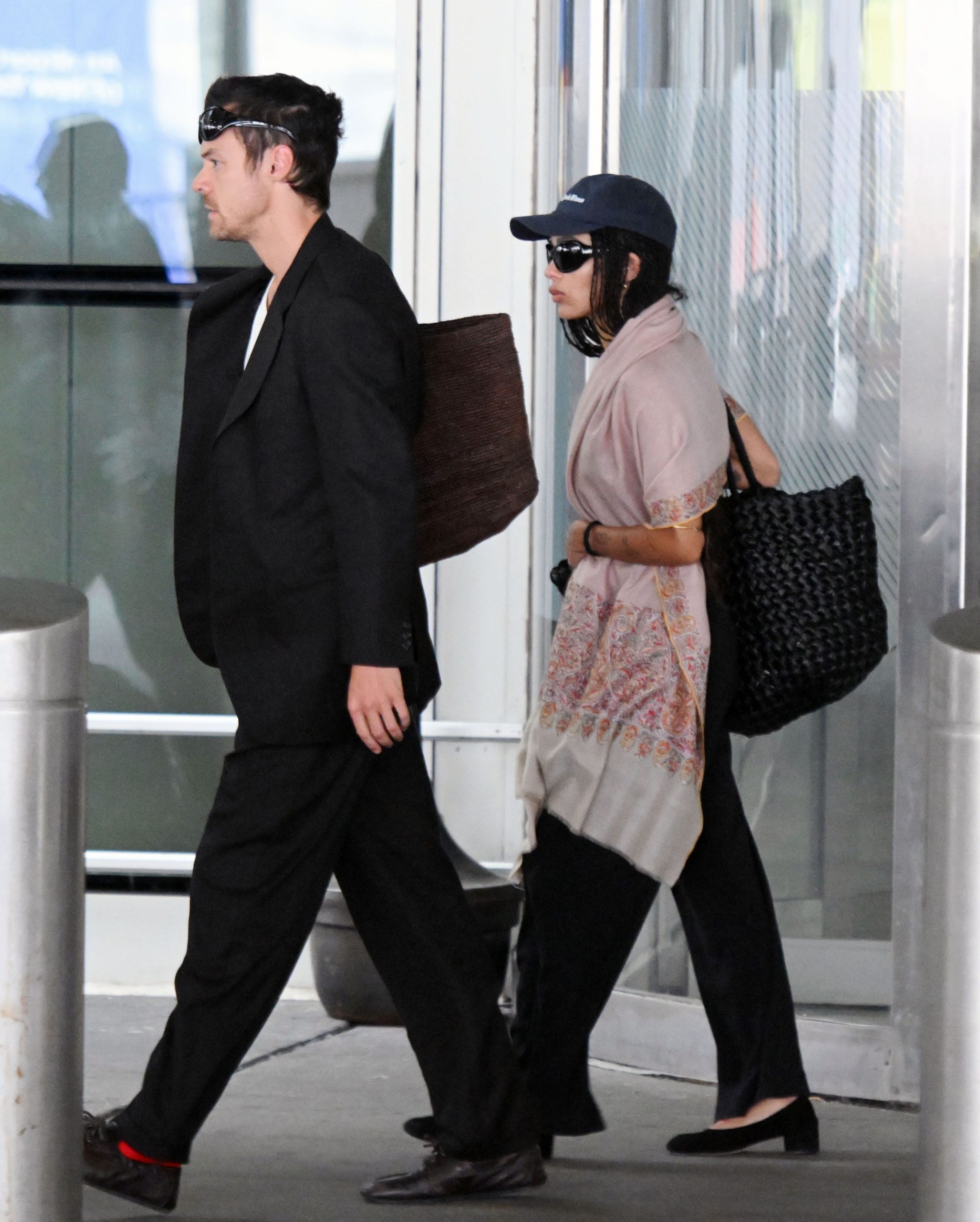 Harry Styles and Zoë Kravitz Propose Different Approaches to the Travel Outfit