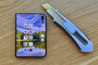 Man Destroys $2,000 iPhone Duo With Dirt, Fire, Knives and Medieval Chainmail