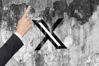 X is nudging users to promote their posts with a pointing hand, and people are confused