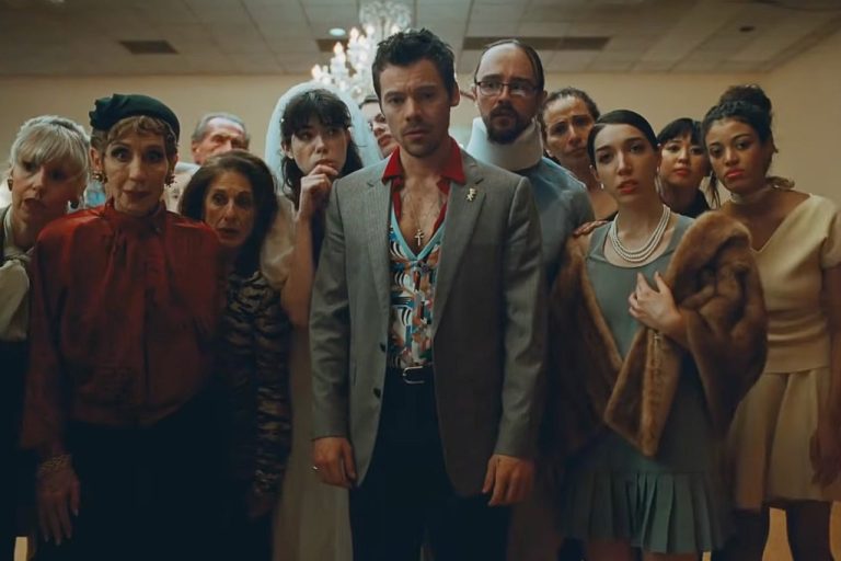 Harry Styles Dances Through His Differences With a Group of Strangers in ‘Coming Up Roses’ Video